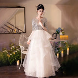 Dress Women 2025 New Champagne Long-Sleeved Banquet Temperament Simple Thin Host Art Exam