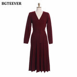 Elegant V-neck Thick Warm Women Knitted Pleated Dress Long Sleeve Belted Sashes Ladies Sweater Dress 2020 Autumn