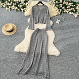 Wearing A Female Gentle Wind High-End Feeling V-Neck Long-Sleeved Empty Crochet Knitted